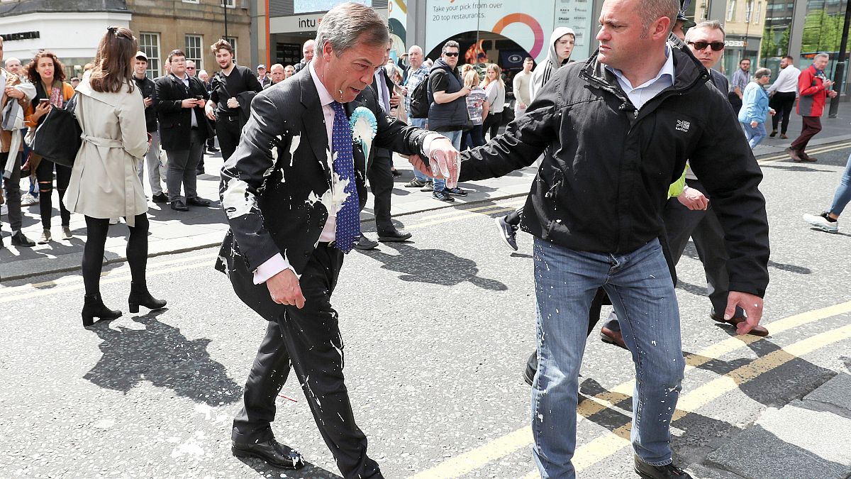 Nigel Farage doused in milkshake on the campaign trail