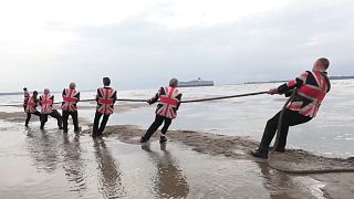 Tug-of-war takes place before island disappears