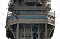 Eiffel Tower evacuated after man climbs on structure