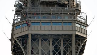 Eiffel Tower evacuated after man climbs on structure
