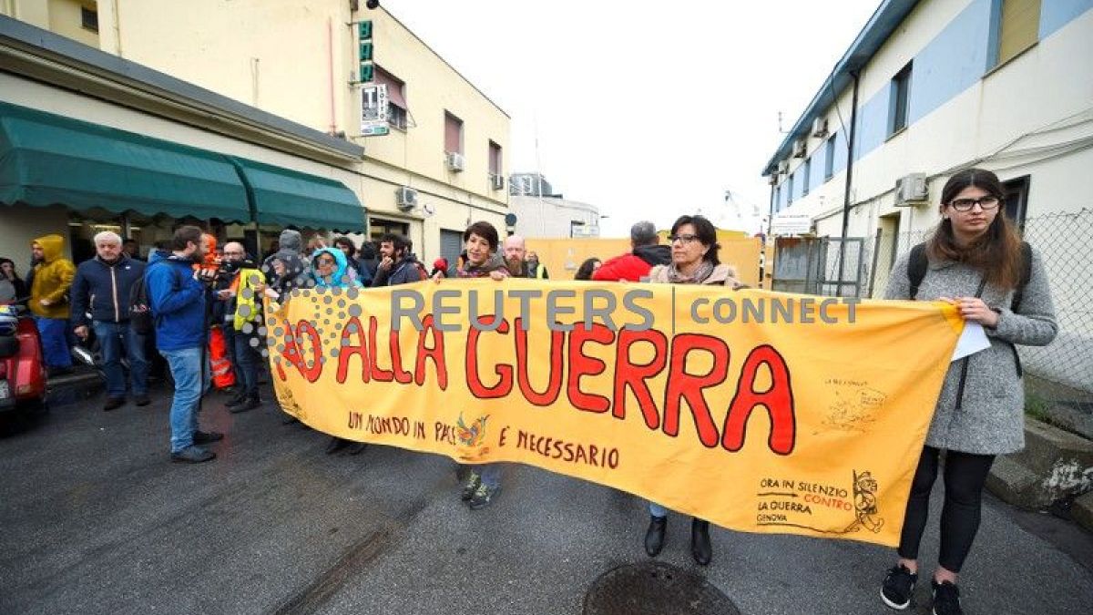 Workers on strike prevent a Saudi ship from loading cargo in Genoa