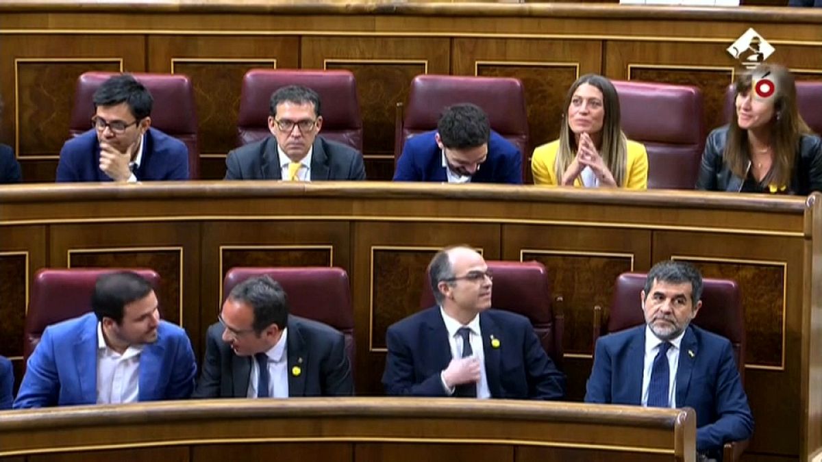 Spanish first as jailed Catalan leaders sworn in at parliament