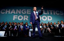 Brexit Party leader Nigel Farage gestures as he speaks in London on 21 May.