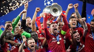 Liverpool lift their sixth Champions League trophy, defeating Tottenham 2-0 in Madrid