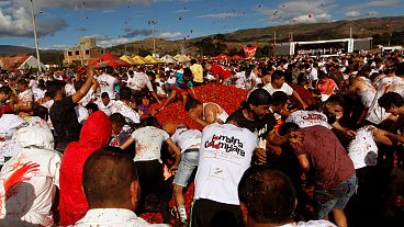 Tomato wars: Colombians paint the town red with mass food fight