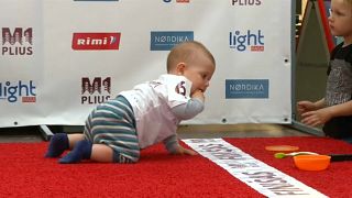 Babies compete in heats on a five-metre carpeted track,