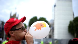 Trump baby blimp flies above London as thousands protest leader's visit