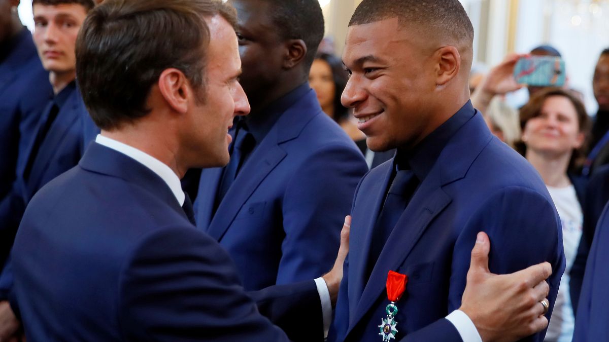 Watch: Macron gives prestigious Legion of Honour order to French football team