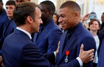 Watch: Macron gives prestigious Legion of Honour order to French football team