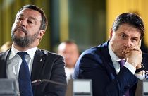 Matteo Salvini and Giuseppe Conte (l-r) face massive fines
