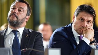 Matteo Salvini and Giuseppe Conte (l-r) face massive fines