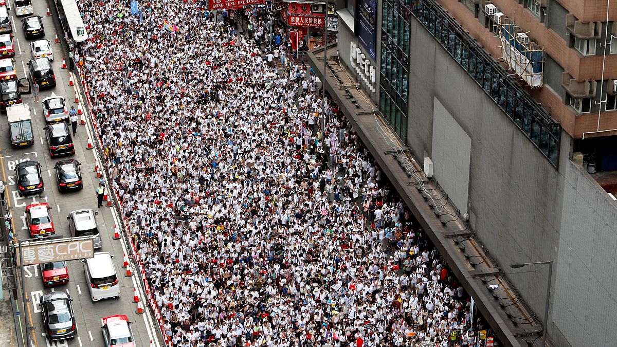 Hundreds of thousands march against extradition bill in Hong Kong