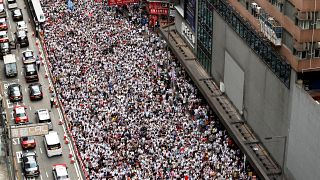 Hundreds of thousands march against extradition bill in Hong Kong