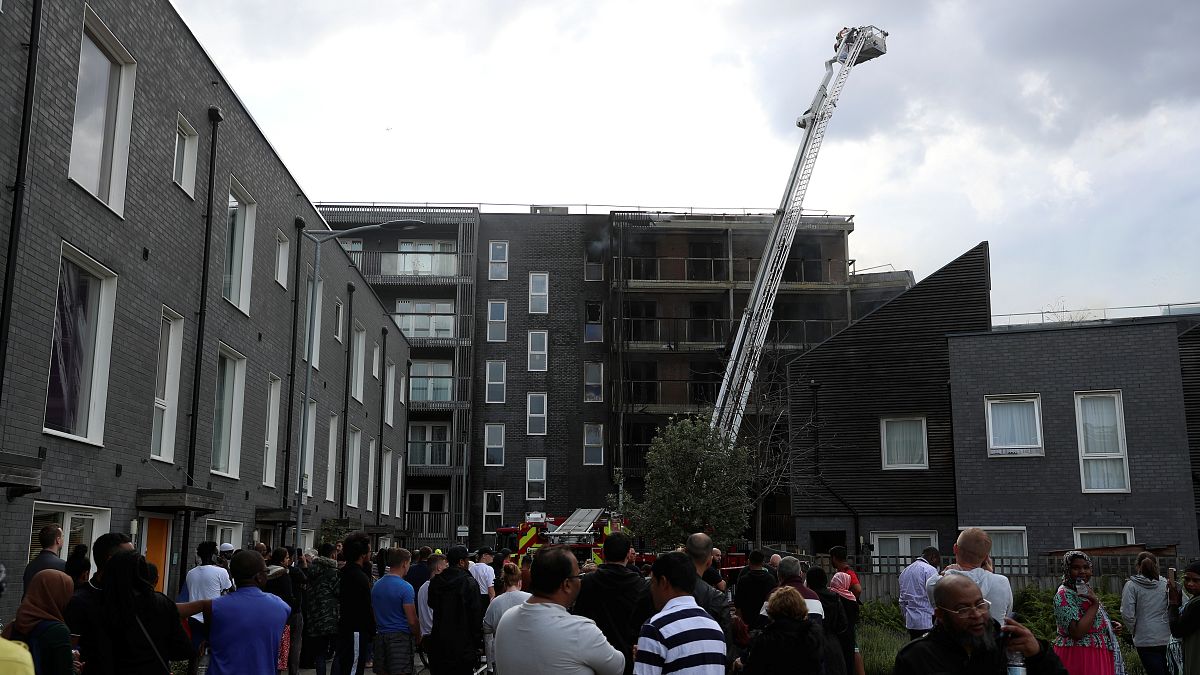 Fire breaks out at London flats as 100 firefighters deal with emergency