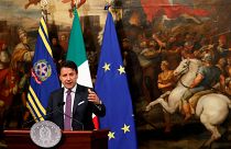 Italian Prime Minister Giuseppe Conte gestures as he holds a news conference at Chigi Palace in Rome