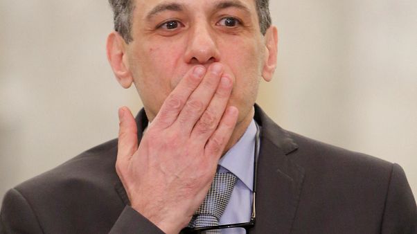Nizar Zakka, who had been detained in Iran since 2015, gestures as he arrives in Lebanon Nizar Zakka, who had been detained in Iran since 2015, gestures as he arrives in Lebanon