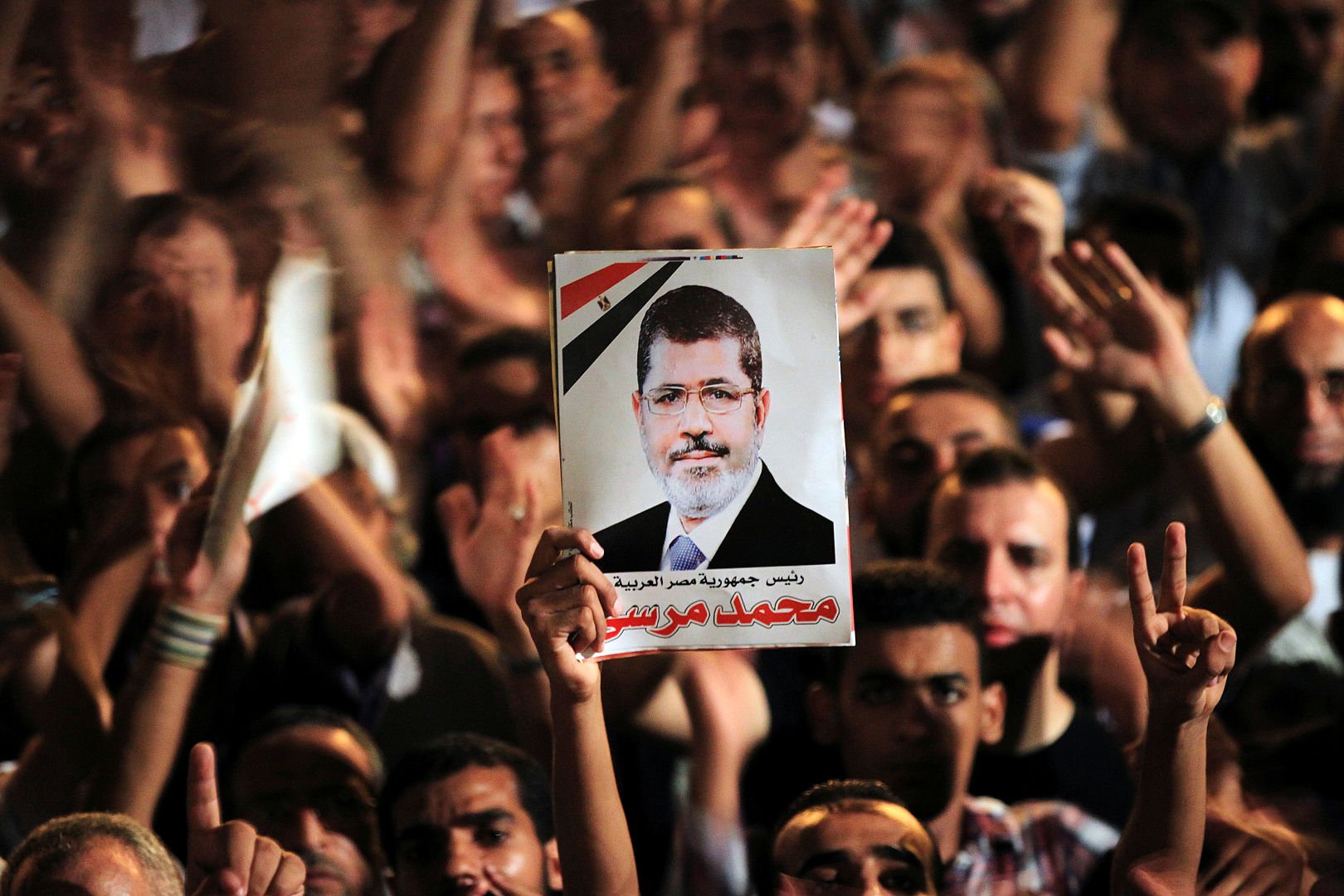 مسيرات شعبية في القاهرة ترفع صور الرئيس السابق حمد مرسي في يوليو/حزيران 2012