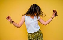 Happy woman dancing