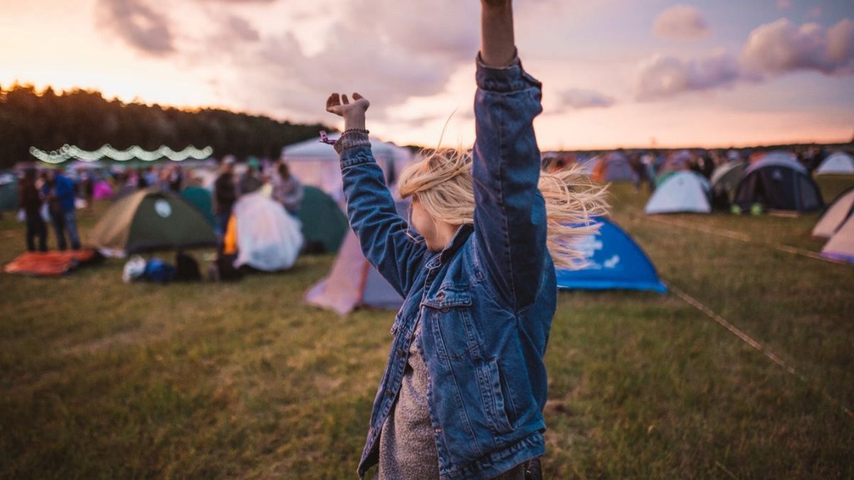 Girl at a festival in a campsite
