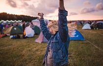 Girl at a festival in a campsite