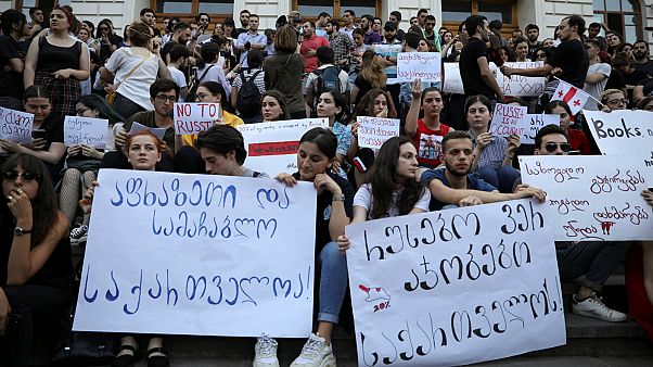 Putin suspends Russian flights to Georgia amid escalating tension Putin suspends Russian flights to Georgia amid escalating tension