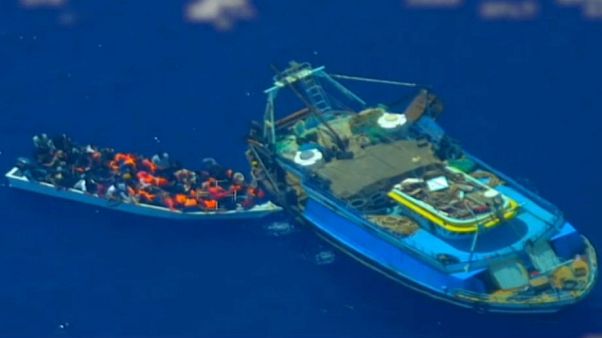 Caught in the act: people smugglers filmed transferring migrants at sea Caught in the act: people smugglers filmed transferring migrants at sea