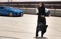 Female racing driver Aseel Al Hamad celebrated the end of the ban on women drivers with a lap of honour in a Jaguar F-TYPE.
