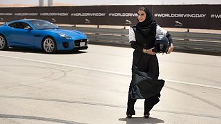 Female racing driver Aseel Al Hamad celebrated the end of the ban on women drivers with a lap of honour in a Jaguar F-TYPE.