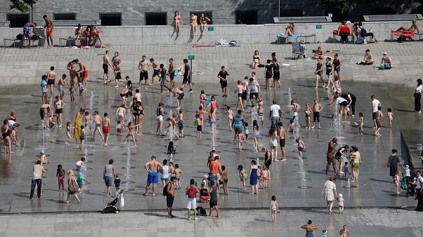 People cool off in the fountains at the Andre Citroen park in Paris as a heatwave hit much of the country, France, June 25, 2019. People cool off in the fountains at the Andre Citroen park in Paris as a heatwave hit much of the country, France, June 25, 2019.