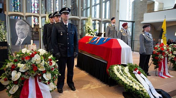 An honour guard made of Police and Federal Armed Force officers stands next to the coffin of the Kassel District President, Walter Luebcke, who was shot, during his funeral An honour guard made of Police and Federal Armed Force officers stands next to the coffin of the Kassel District President, Walter Luebcke, who was shot, during his funeral