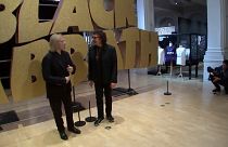 O baixista Geezer Butler e o guitarrista Tony Iommi na abertura da exposição