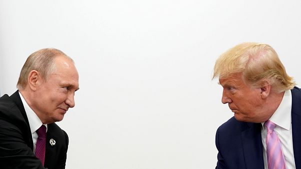 Trump gives Putin light-hearted warning: 'don't meddle in election' Trump gives Putin light-hearted warning: 'don't meddle in election'