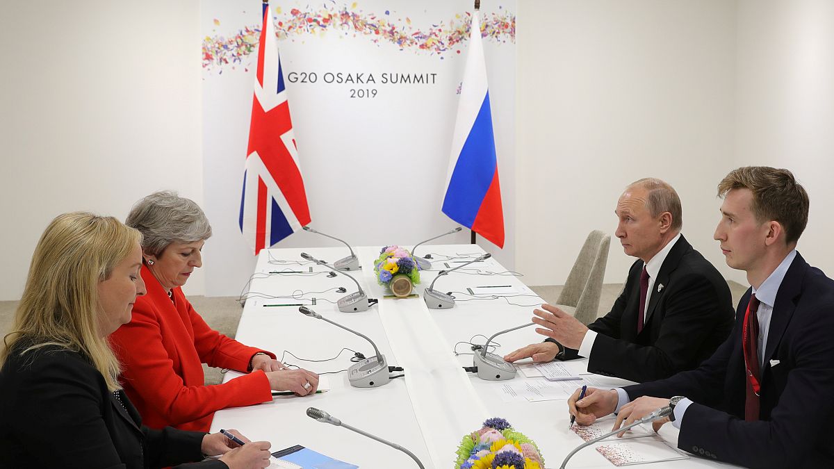 Russia's President Vladimir Putin and Britain's Prime Minister Theresa May attend a meeting on the sidelines of the G20 summit in Osaka, Japan June 28, 2019