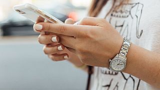 Woman using an iphone