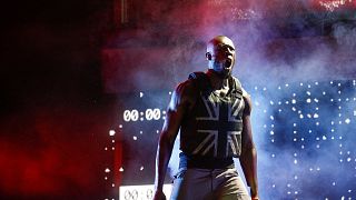 UK rapper Stormzy gives political Glastonbury performance with Banksy-designed stab-proof vest