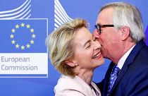 German Defense Minister von der Leyen poses with EU Commission President Juncker in Brussels