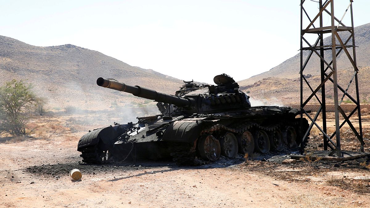 FILE PHOTO: A destroyed and burnt tank, that belongs to the eastern forces led by Khalifa Haftar, is seen in Gharyan south of Tripoli Libya June 27, 2019. 