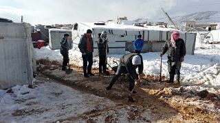 لاجئون سوريون في معسكر في بلدة عرسال في لبنان في صورة بتاريخ التاسع من يناير كانون الثاني 2019. تصوير رويترز.