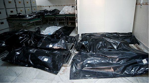 Body bags of victims from the Tajoura migrant centre strike Body bags of victims from the Tajoura migrant centre strike
