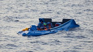 A blue inflatable boat that was carrying 65 people, is seen in this picture obtained from social media on July 5, 2019.