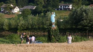A sculpture of US first lady Melania Trump is officially unveiled in Rozno, near her hometown of Sevnica, Slovenia, July 5, 2019.