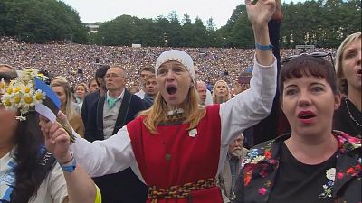 Tens of thousands of Estonians perform mass folk singing