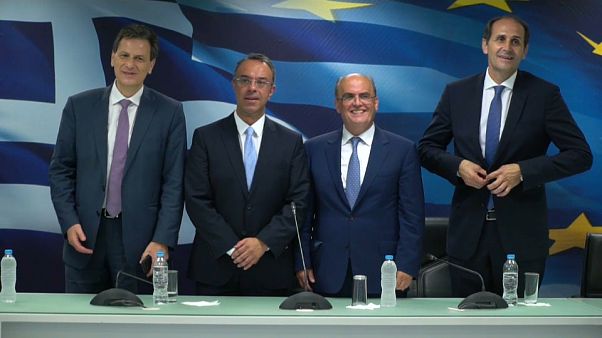 Os novos rostos das finanças gregas Os novos rostos das finanças gregas