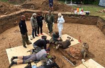 Archaeologists take part in excavation works after they discovered what they believe to be the burial site of French General Charles Etienne Gudin in a park in Smolensk.