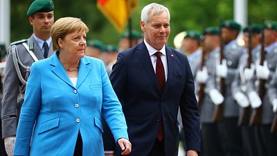 'I am fine', says Angela Merkel after third bout of shaking in under a month