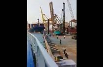 Container ship crashes into gantry crane in Indonesia