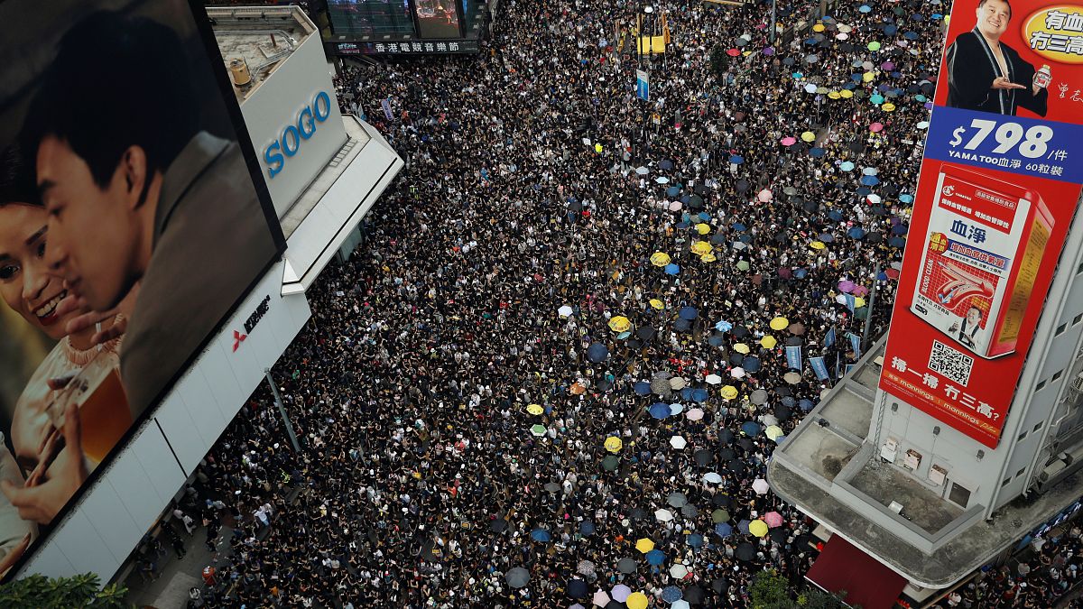 Hong Kong protesters march to demand independent inquiry into police tactics