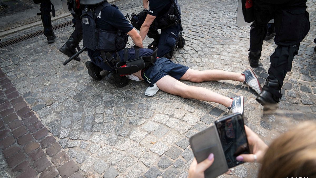 A photo posted on social media of police arresting an anti-LGBT protester