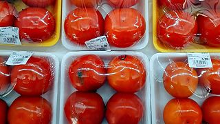 Tomatoes wrapped in several layers of plastic