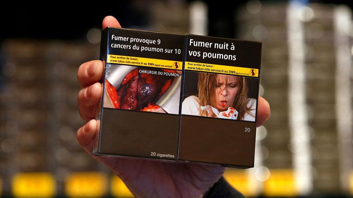 Where do the health warning photos on cigarette boxes come from?